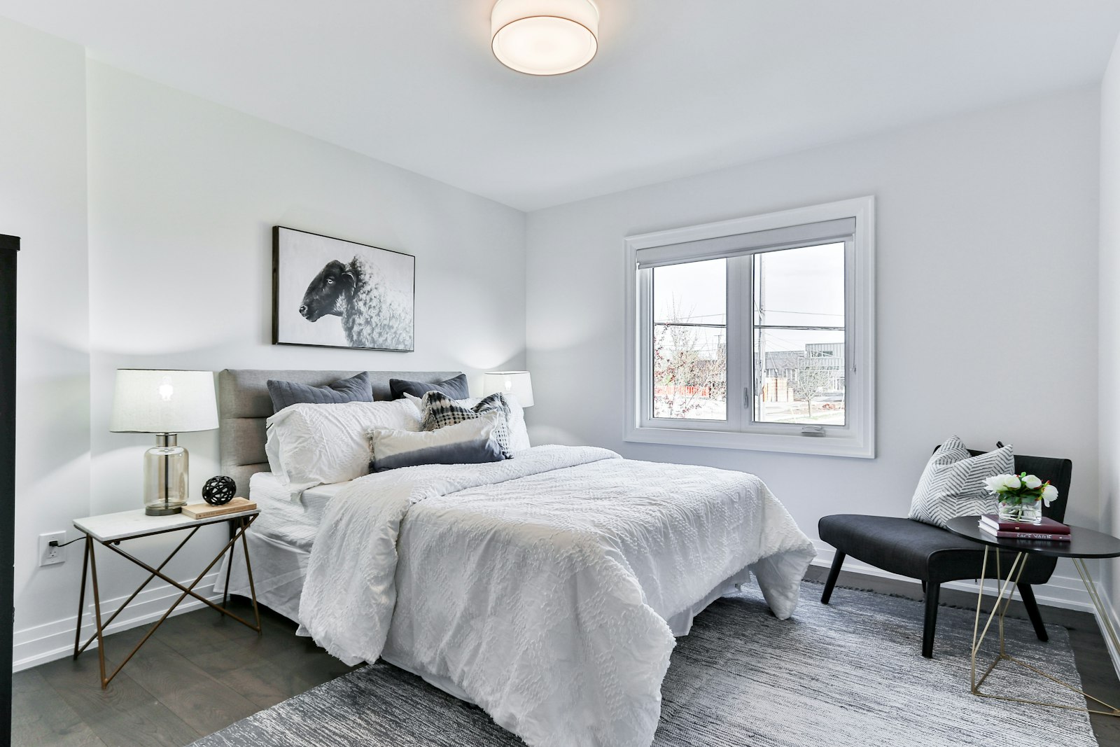 Bright white bedroom with a window