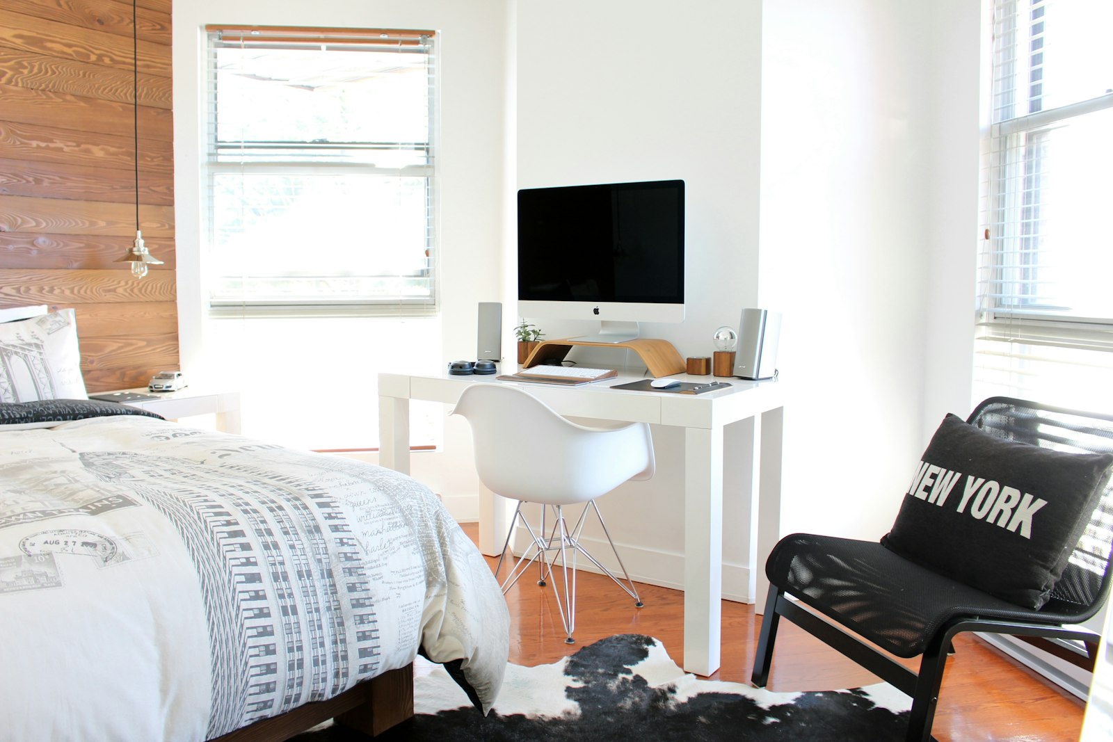Student room with a desk, chair and single bed