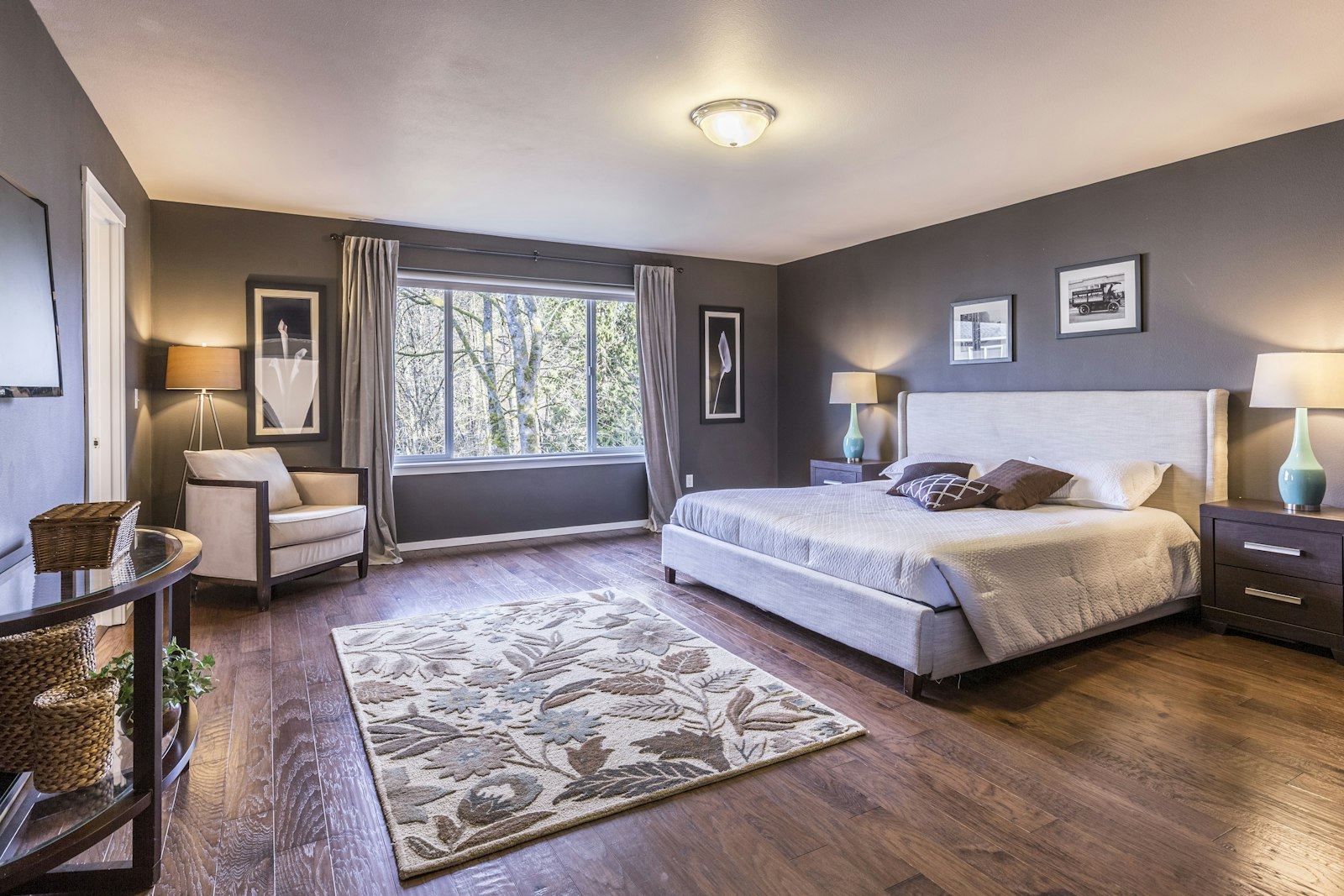 Spacious bedroom with a large window